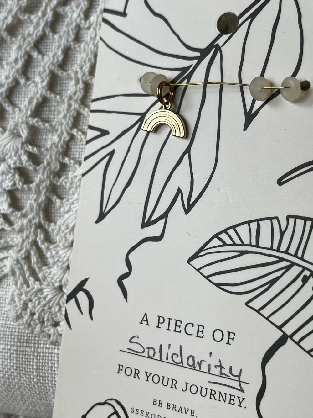 Sseko Solidarity Rainbow Charm Gold